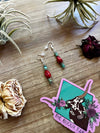 Green turquoise dangle earrings with red corral