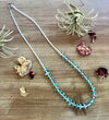 26 inch long blue disk turquoise necklace